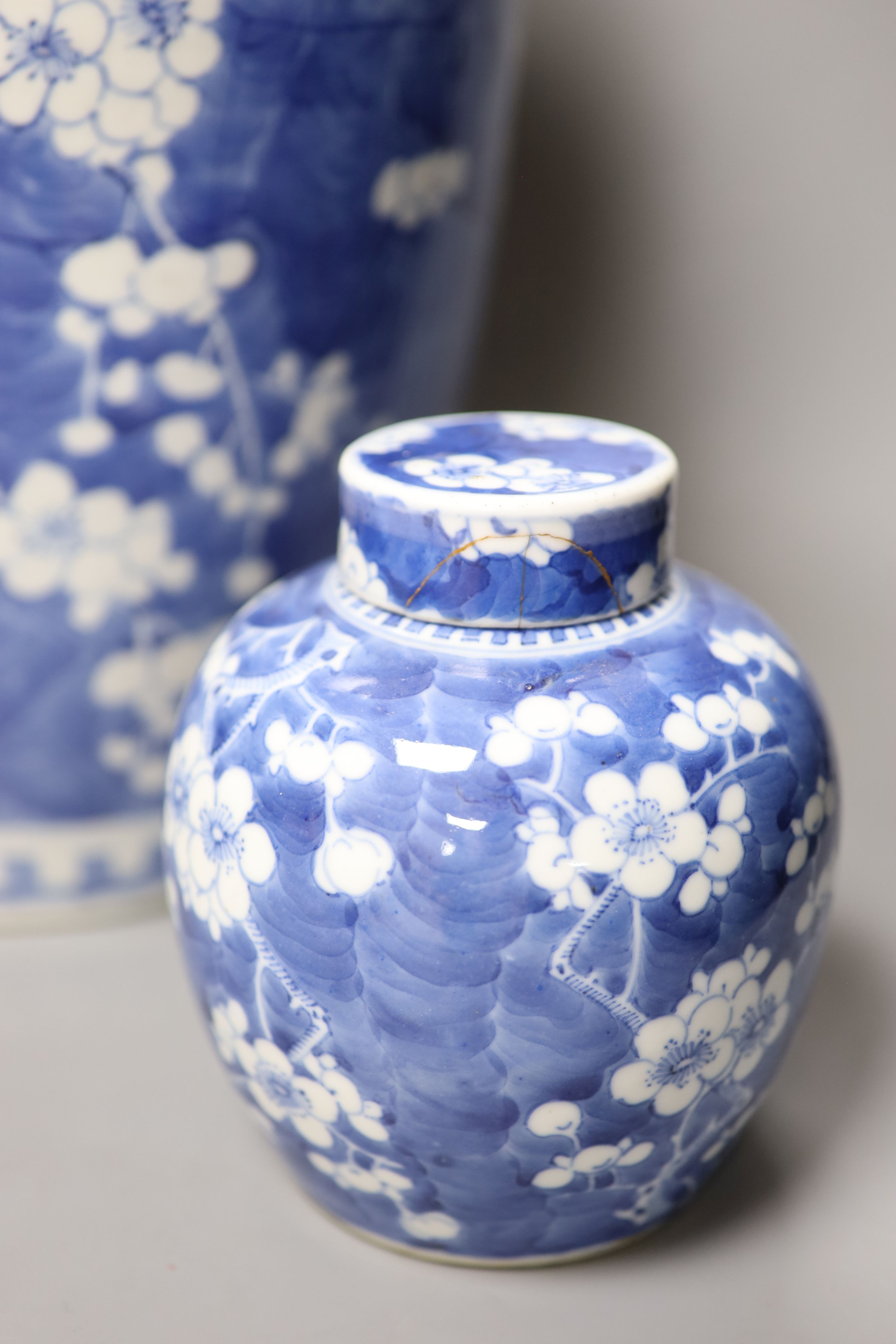 A tall 19th century Chinese blue and white lidded vase and a pair of lidded ginger jars, tallest 45cm